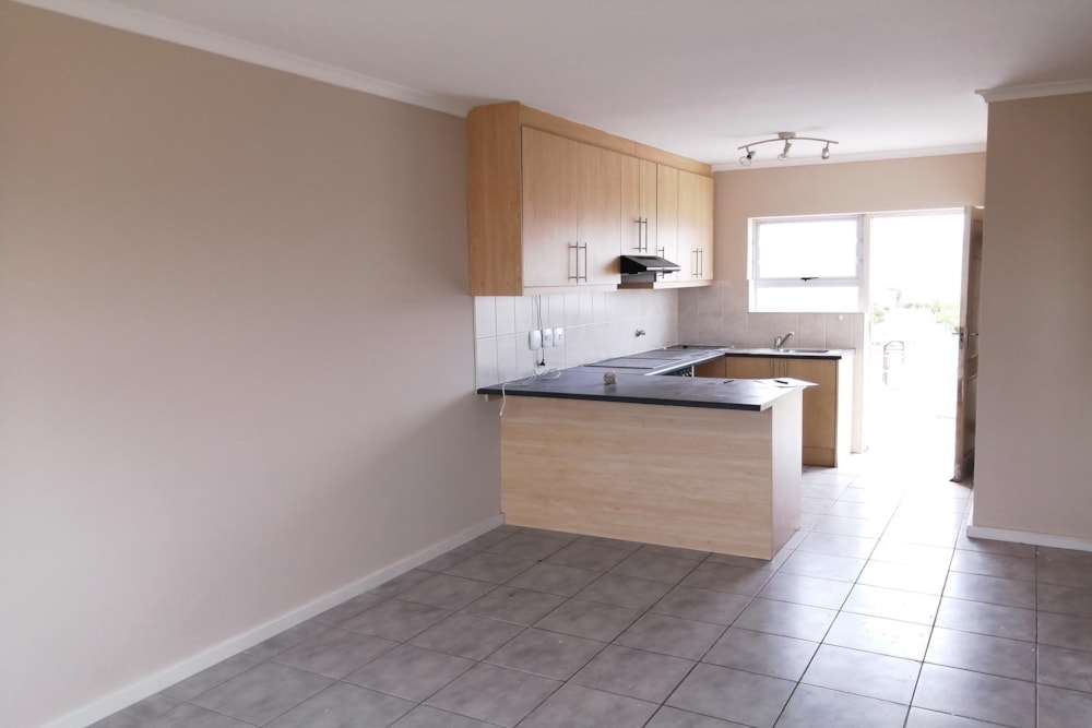 Security complex home to rent in Melkbosstrand - 1TV1731185