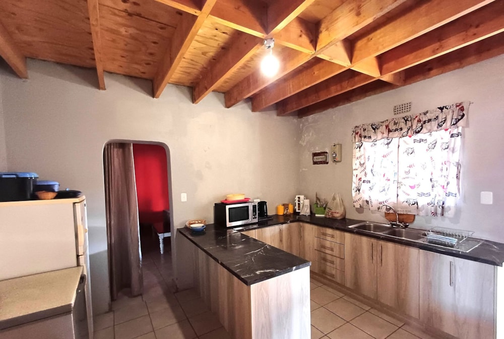House for sale in Oudtshoorn - 1OU1669568 House for sale in Oudtshoorn - 1OU1669568