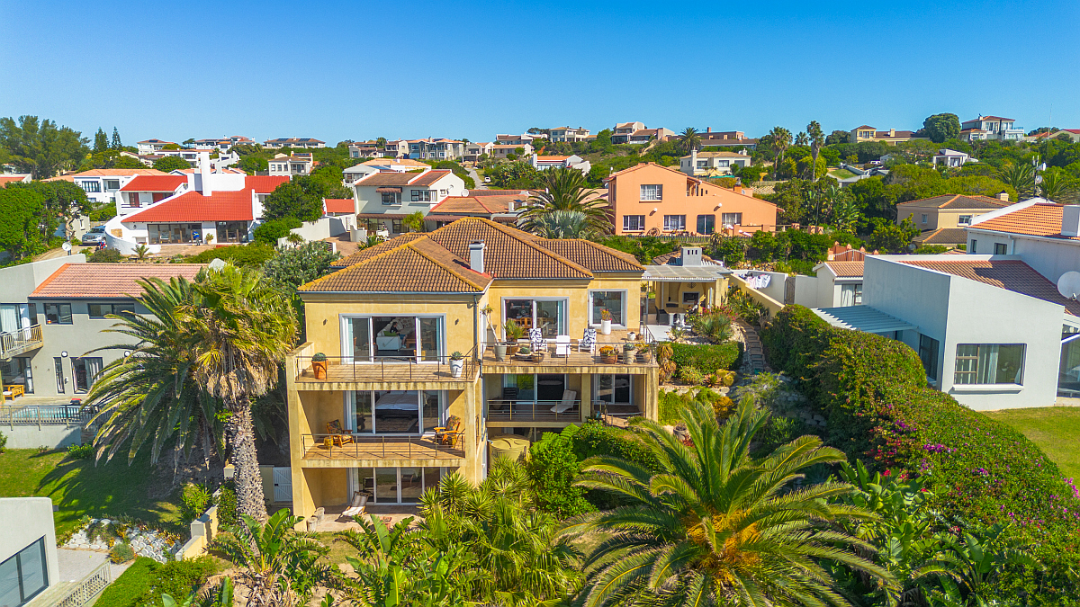 Priced at R7.95 million through Pam Golding Properties and situated in the popular Santareme area, this three-level home offers great ocean views, a double garage, and open-plan lounge, kitchen, and dining area, plus two large patios and a covered braai area.