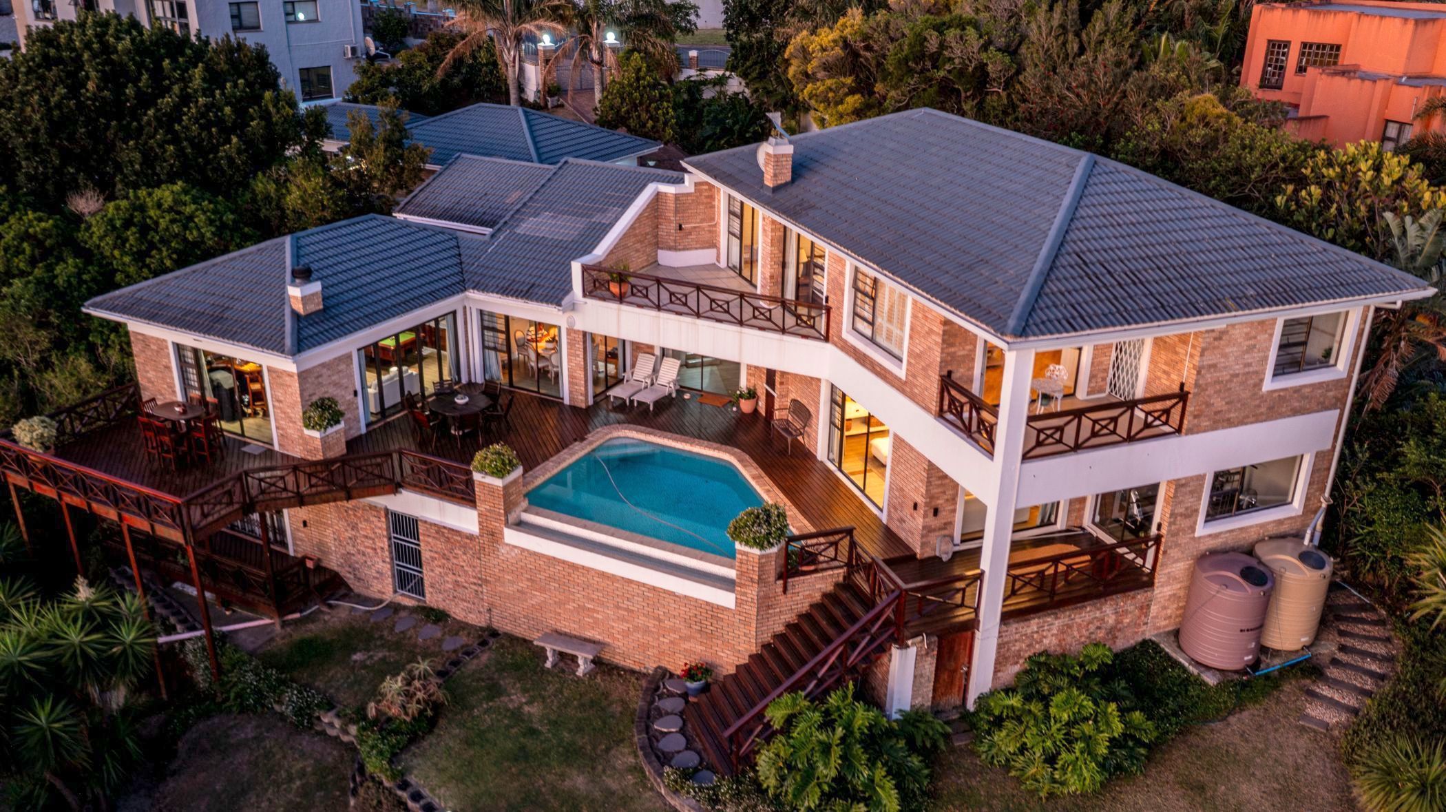 Priced at R4.995 million through Pam Golding Properties, this spacious five-bedroom, double-storey family home in Beacon Bay, East London, with sweeping views over the Nahoon River, includes a swimming pool deck, games room with built-in bar, a large, separate guest suite, double garage and water tanks. 