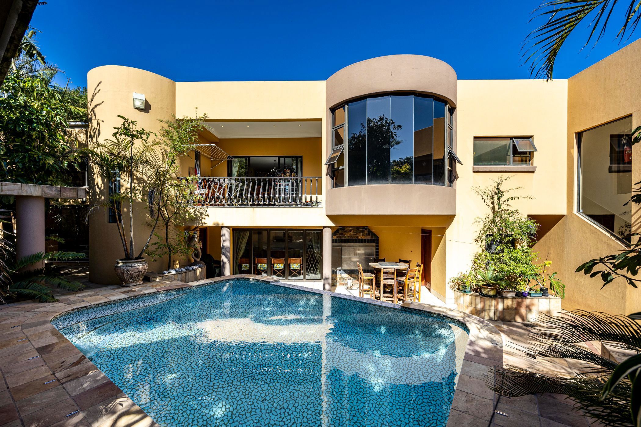 : Priced at R8.75 million through Pam Golding Properties, this opulent designer home in Gonubie in East London includes a kitchen fit for a chef with Siemens appliances and a glass and gas hob, spacious and airy lounge with grand wooden sliding doors that open to the balcony with views of the Indian Ocean. 