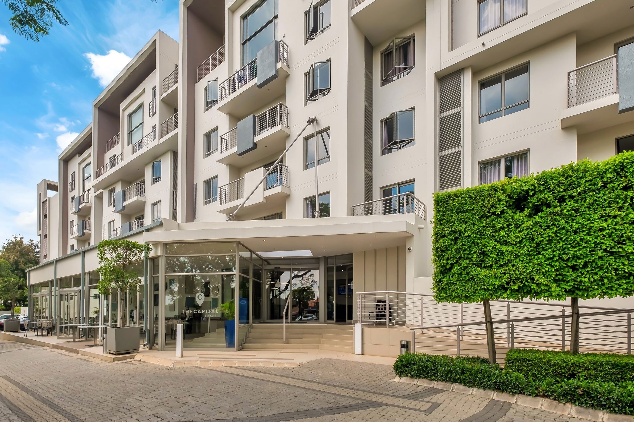 Priced at R1 million through Pam Golding Properties, this contemporary, one-bedroom studio apartment in Rosebank, Johannesburg is ideal for stayovers for Johannesburg business meetings, just a short walk to the Gautrain Station to OR Tambo International Airport or elsewhere. Overlooking the garden, this is a quiet location, with its own in-house gym and restaurant, in proximity to some of the best restaurants and retail in Johannesburg. Priced at R1 million through Pam Golding Properties, this contemporary, one-bedroom studio apartment in Rosebank, Johannesburg is ideal for stayovers for Johannesburg business meetings, just a short walk to the Gautrain Station to OR Tambo International Airport or elsewhere. Overlooking the garden, this is a quiet location, with its own in-house gym and restaurant, in proximity to some of the best restaurants and retail in Johannesburg.