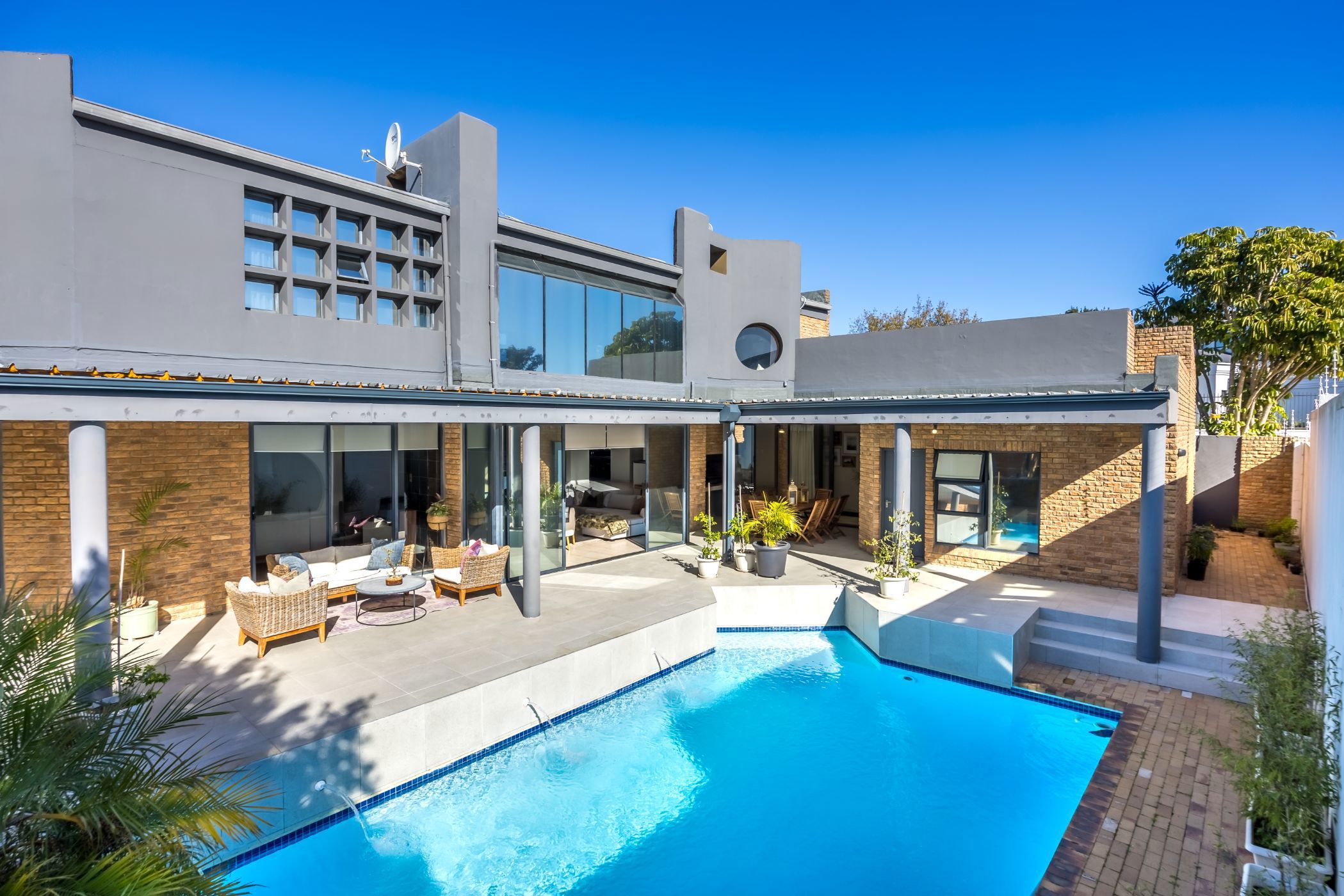 Durbanville, Welgemoed R5.85m: Priced at R5.85 million through Pam Golding Properties, this immaculate, spacious, five-bedroom home in a prestigious, prime location in Welgemoed, Durbanville, has an abundance of double-volume spaces and seamless open-plan living areas drenched in natural light. It includes cosy lounges, sophisticated bar area, designer kitchen, study, music room, covered patio with a built-in braai overlooking the swimming pool and entertainment area, staff quarters, three garages and picturesque views. Durbanville, Welgemoed R5.85m: Priced at R5.85 million through Pam Golding Properties, this immaculate, spacious, five-bedroom home in a prestigious, prime location in Welgemoed, Durbanville, has an abundance of double-volume spaces and seamless open-plan living areas drenched in natural light. It includes cosy lounges, sophisticated bar area, designer kitchen, study, music room, covered patio with a built-in braai overlooking the swimming pool and entertainment area, staff quarters, three garages and picturesque views.
