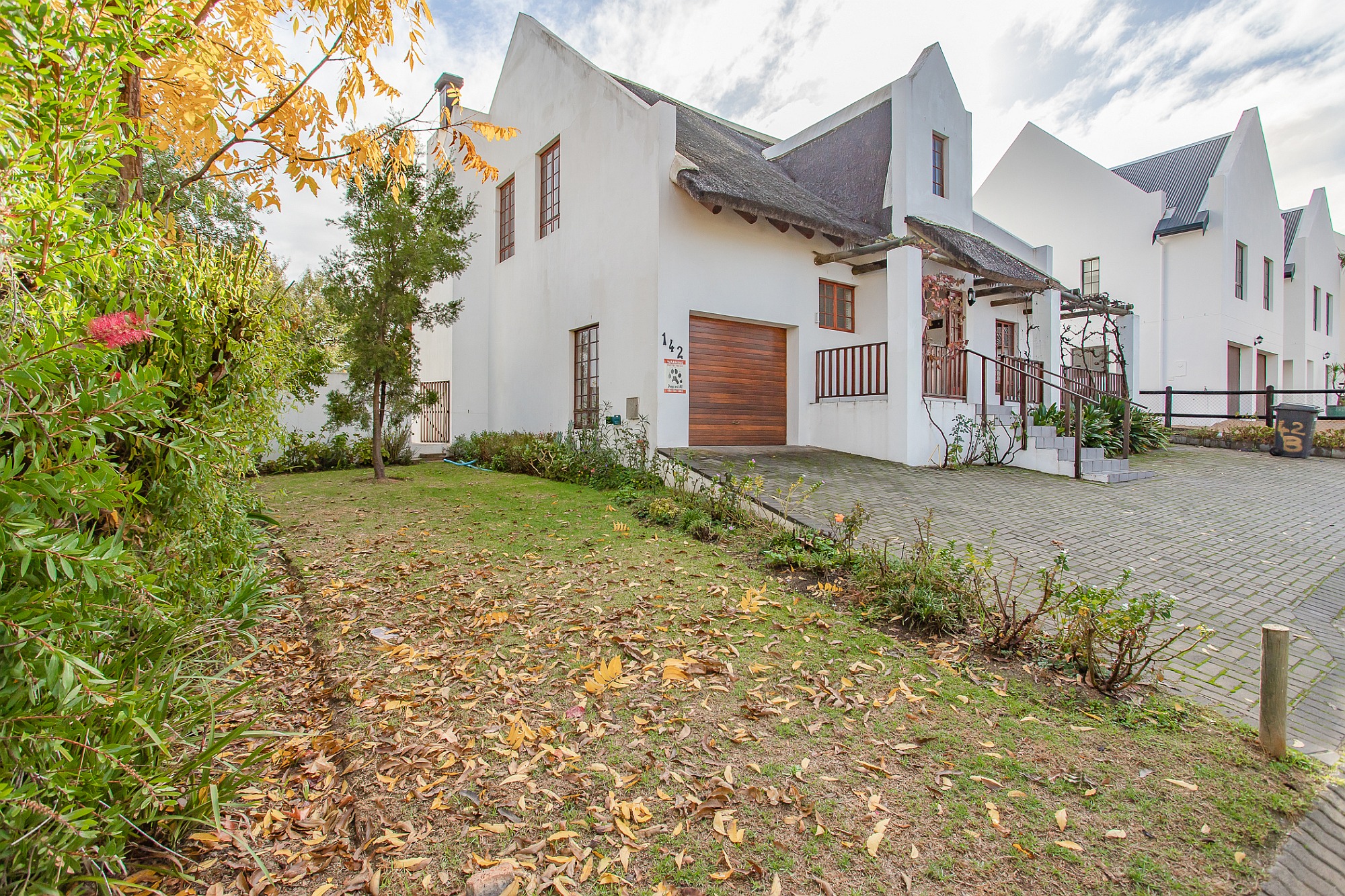 Situated in Wellington, this Cape Dutch home with double-volume ceilings is set on a large, landscaped park area in Onverwacht Estate, a working farm with dams and open green spaces for children to play. Priced at R2.295 million through Pam Golding Properties, this two-bedroom (both en-suite) home has potential to create additional living space. The open plan kitchen, dining room and lounge flows to the indoor braai area which opens onto a private swimming pool. Situated in Wellington, this Cape Dutch home with double-volume ceilings is set on a large, landscaped park area in Onverwacht Estate, a working farm with dams and open green spaces for children to play. Priced at R2.295 million through Pam Golding Properties, this two-bedroom (both en-suite) home has potential to create additional living space. The open plan kitchen, dining room and lounge flows to the indoor braai area which opens onto a private swimming pool.