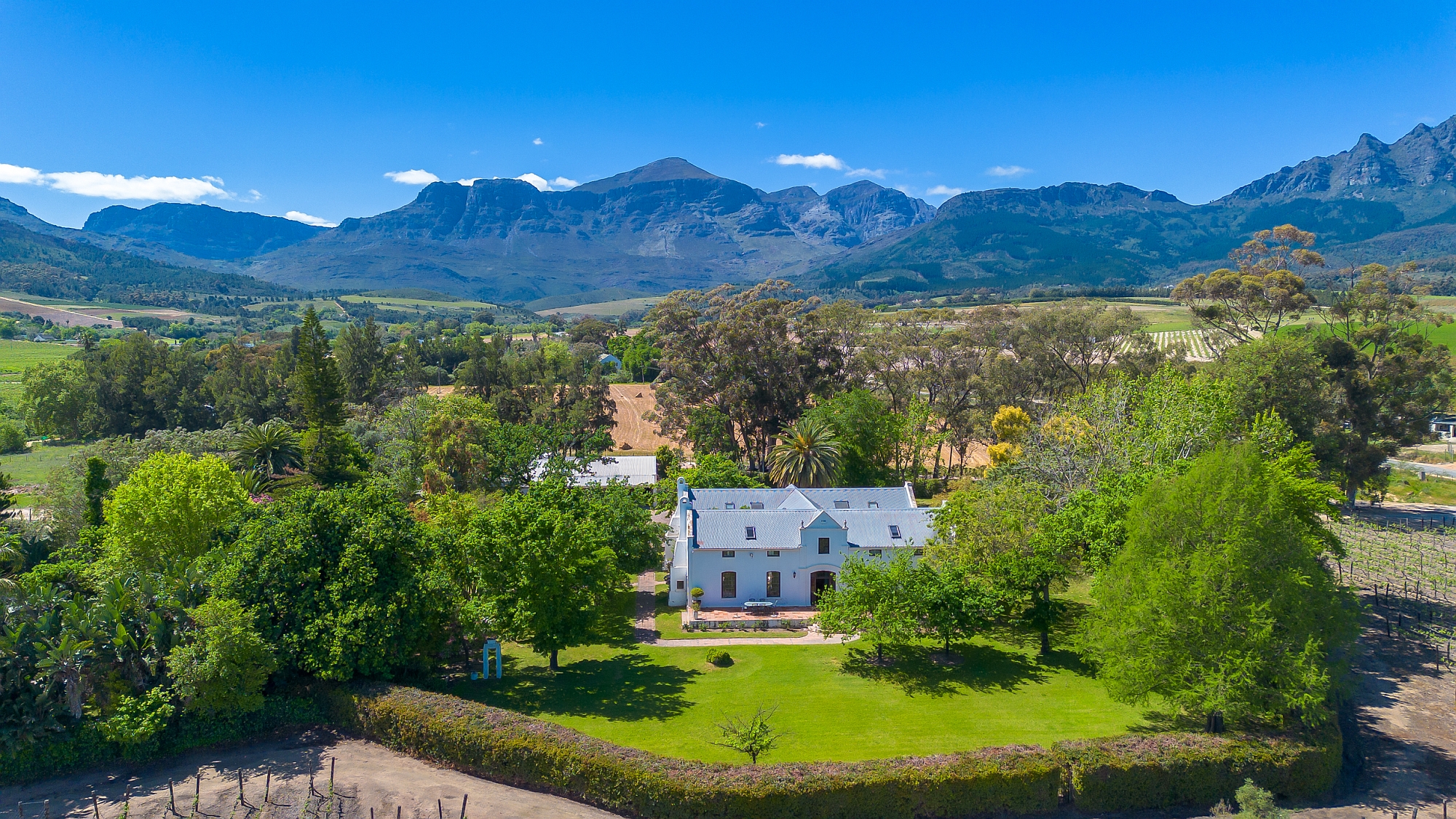 This five-bedroom, five-bathroom luxury lifestyle vineyard estate in the heart of Wellington’s Bovlei Valley is marketed by Pam Golding Properties at R35 million.