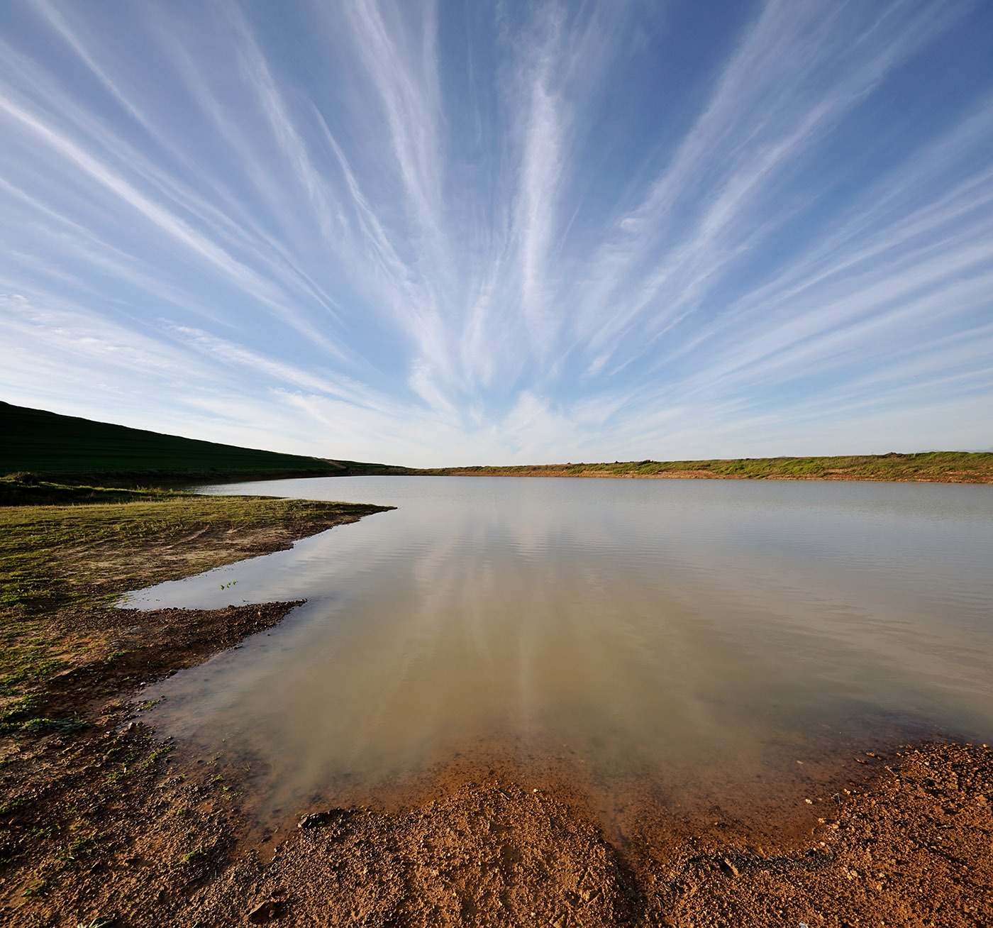 Unusual cloud formation reflected in a farm dam Unusual cloud formation reflected in a farm dam
