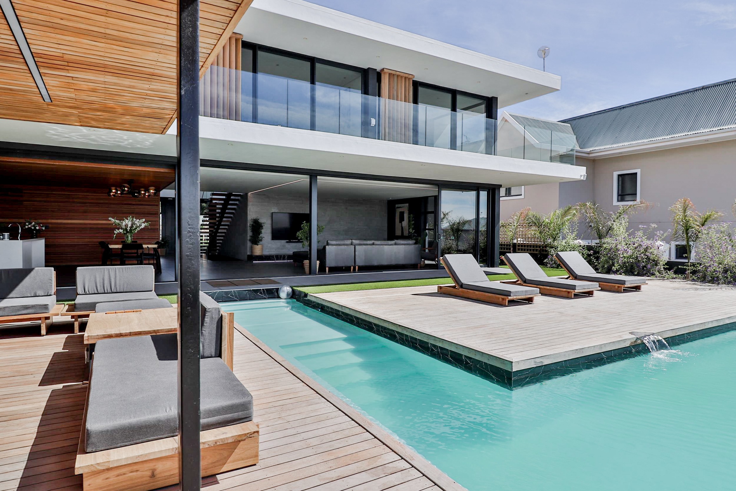 Meticulously curated for a bespoke lifestyle, this solar-powered off-the-grid, six-bedroom residence is one of the most desirable properties in Langebaan and is priced at R19 million through Pam Golding Properties. With a multitude of indoor and outdoor entertainment spaces set over three levels, spectacular sea and lagoon views and heated infinity pool, the property includes a fully kitted gym, African Teak bar, home cinema, private work-from-home space, private flat and double garage to accommodate a boat/caravan. Meticulously curated for a bespoke lifestyle, this solar-powered off-the-grid, six-bedroom residence is one of the most desirable properties in Langebaan and is priced at R19 million through Pam Golding Properties. With a multitude of indoor and outdoor entertainment spaces set over three levels, spectacular sea and lagoon views and heated infinity pool, the property includes a fully kitted gym, African Teak bar, home cinema, private work-from-home space, private flat and double garage to accommodate a boat/caravan.