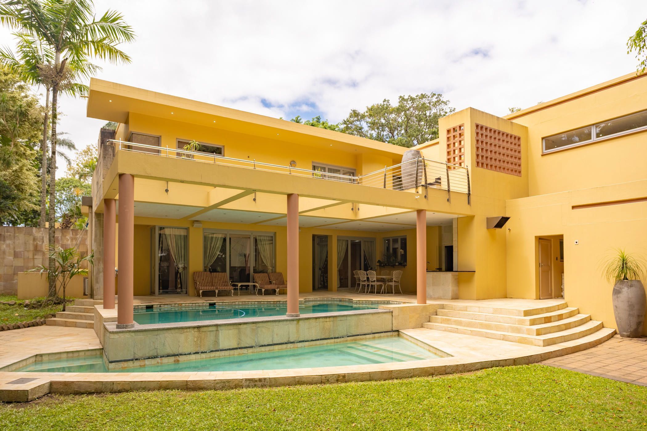 : Priced at R6.49 million through Pam Golding Properties, this luxury home set on a flat erf in the prestigious Beverley Hills area includes five spacious bedrooms, all en-suite, stylish open-plan kitchen, elegant entertainment room, indoor glassed garage, swimming pool, sauna, and staff quarters. 