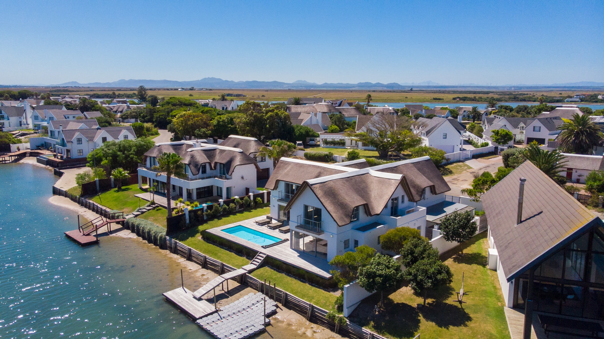 This immaculate five-bedroom home (in foreground) on the canals in St Francis Bay has broad appeal to buyers – whether young or mature families, retirees, or those seeking a permanent home or a luxurious holiday spot. The property is priced at R12.9 million through Pam Golding Properties. This immaculate five-bedroom home (in foreground) on the canals in St Francis Bay has broad appeal to buyers – whether young or mature families, retirees, or those seeking a permanent home or a luxurious holiday spot. The property is priced at R12.9 million through Pam Golding Properties.