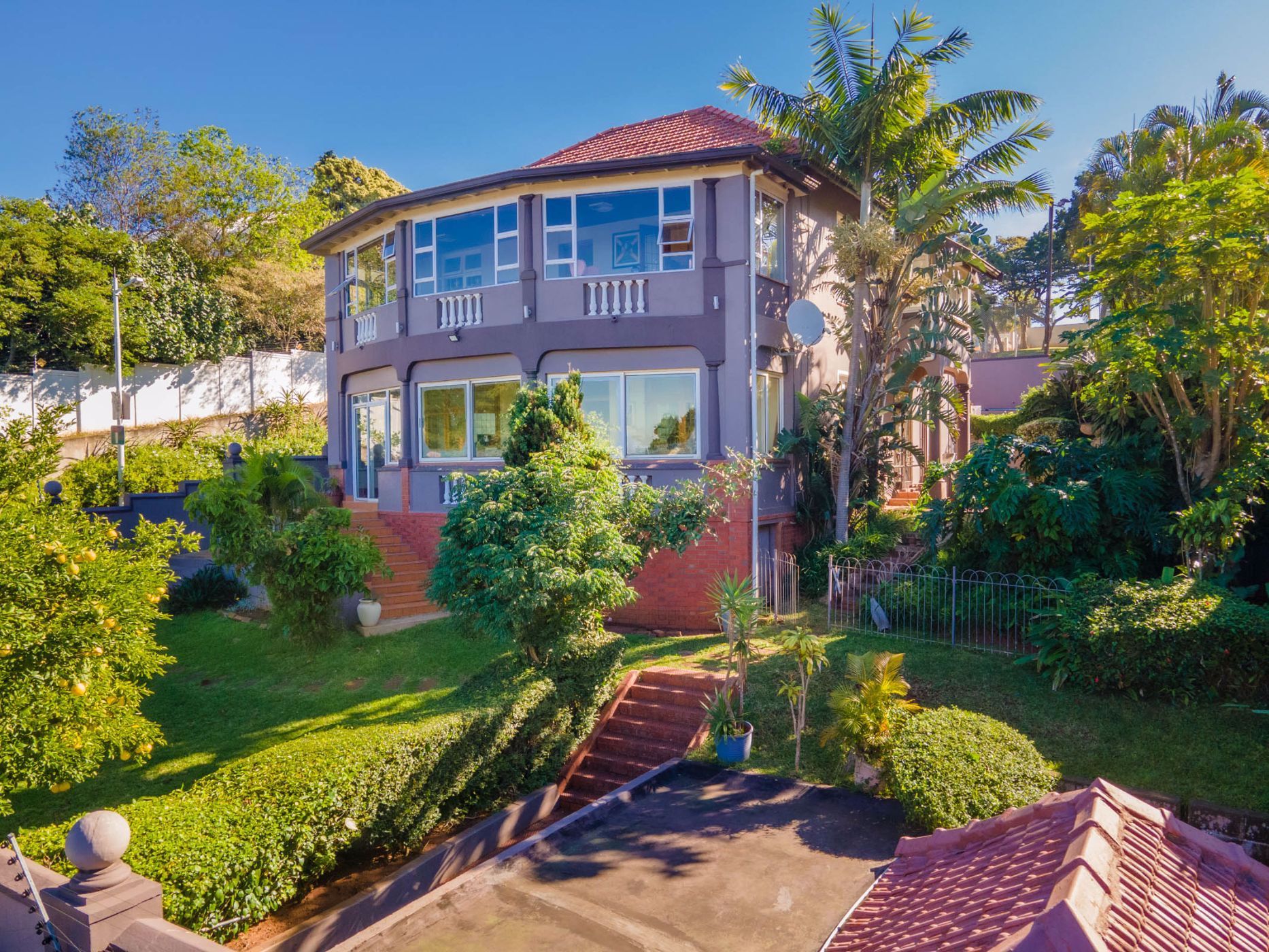 This spacious double-storey, five-bedroom home in Glenwood situated high up on the hill next to St Henry’s Marist Brothers, this well positioned family home has easy access to Howard College and the N3 freeway. Priced at R3.25 million through Pam Golding Properties, it has high ceilings, wood strip floors and stained-glass detail throughout, as well as a newly-renovated kitchen, two automated garages and a carport, swimming pool and separate one-bedroom flat ideal as a home office, teen pad or staff quarters. The property includes a generator. This spacious double-storey, five-bedroom home in Glenwood situated high up on the hill next to St Henry’s Marist Brothers, this well positioned family home has easy access to Howard College and the N3 freeway. Priced at R3.25 million through Pam Golding Properties, it has high ceilings, wood strip floors and stained-glass detail throughout, as well as a newly-renovated kitchen, two automated garages and a carport, swimming pool and separate one-bedroom flat ideal as a home office, teen pad or staff quarters. The property includes a generator.