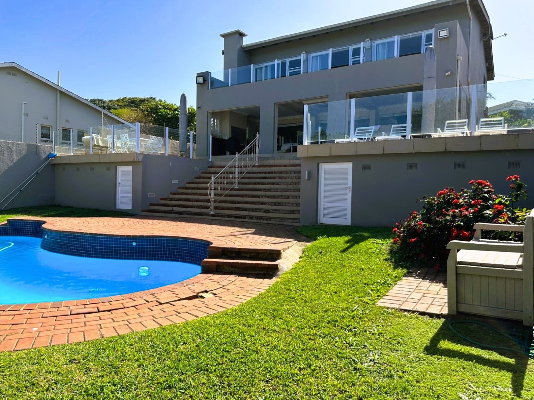 This luxury four-bedroom, double-storey beachfront home in Ramsgate has ocean views from almost every room. It includes a one-bedroom, one-bathroom flatlet, swimming pool and landscaped garden, water tanks and CCTV cameras, and is priced at R6 million through Pam Golding Properties. This luxury four-bedroom, double-storey beachfront home in Ramsgate has ocean views from almost every room. It includes a one-bedroom, one-bathroom flatlet, swimming pool and landscaped garden, water tanks and CCTV cameras, and is priced at R6 million through Pam Golding Properties.