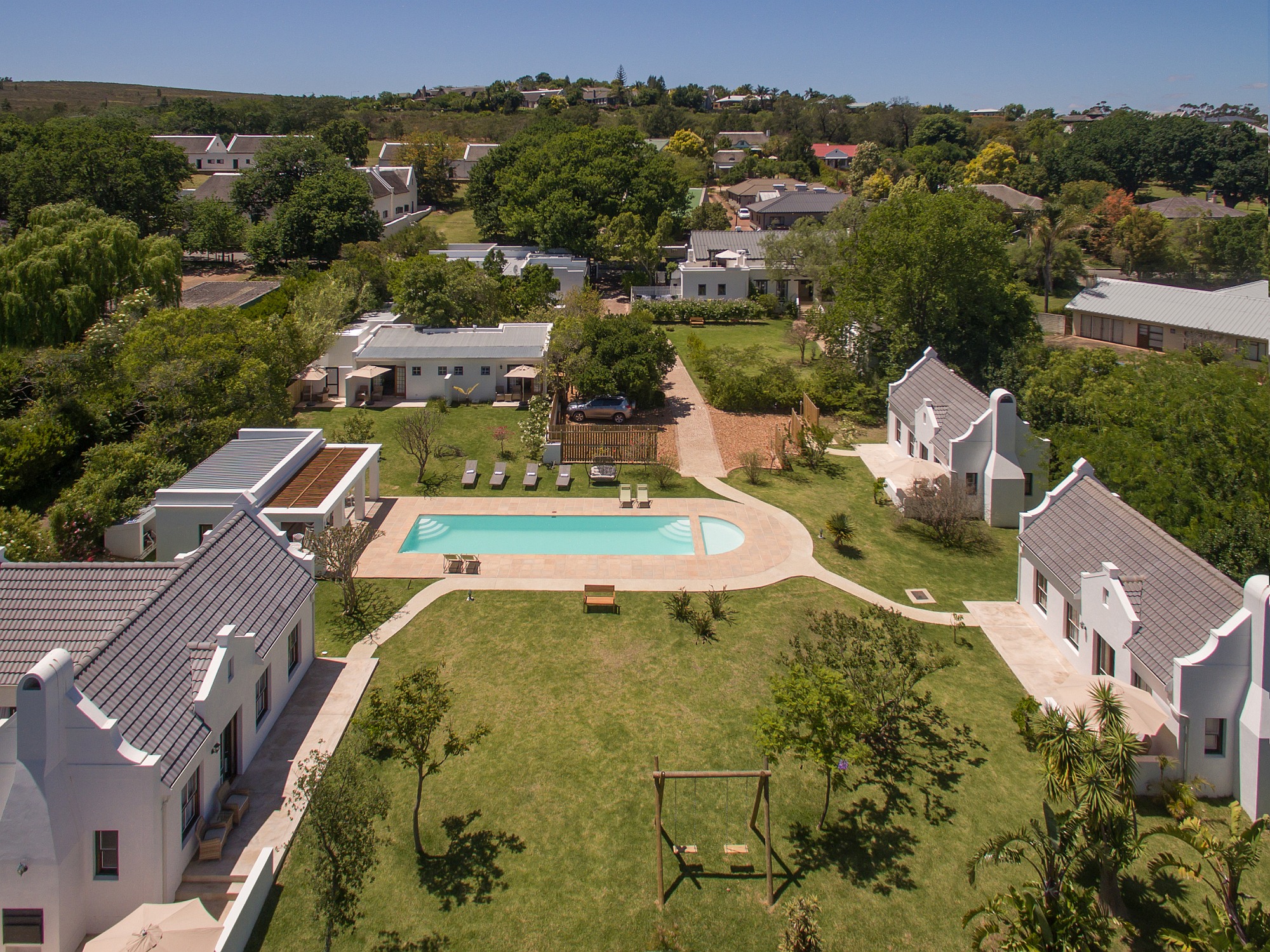 This Heritage property, the 4 Star, Roosje van de Kaap boutique hotel in Swellendam, is marketed through Pam Golding Properties for R16.5 million (plus VAT). It includes 14 elegantly decorated bedrooms and bathrooms, two pools in a lush garden and a fully-equipped restaurant, and has sweeping views of the Langeberg mountains. This Heritage property, the 4 Star, Roosje van de Kaap boutique hotel in Swellendam, is marketed through Pam Golding Properties for R16.5 million (plus VAT). It includes 14 elegantly decorated bedrooms and bathrooms, two pools in a lush garden and a fully-equipped restaurant, and has sweeping views of the Langeberg mountains.