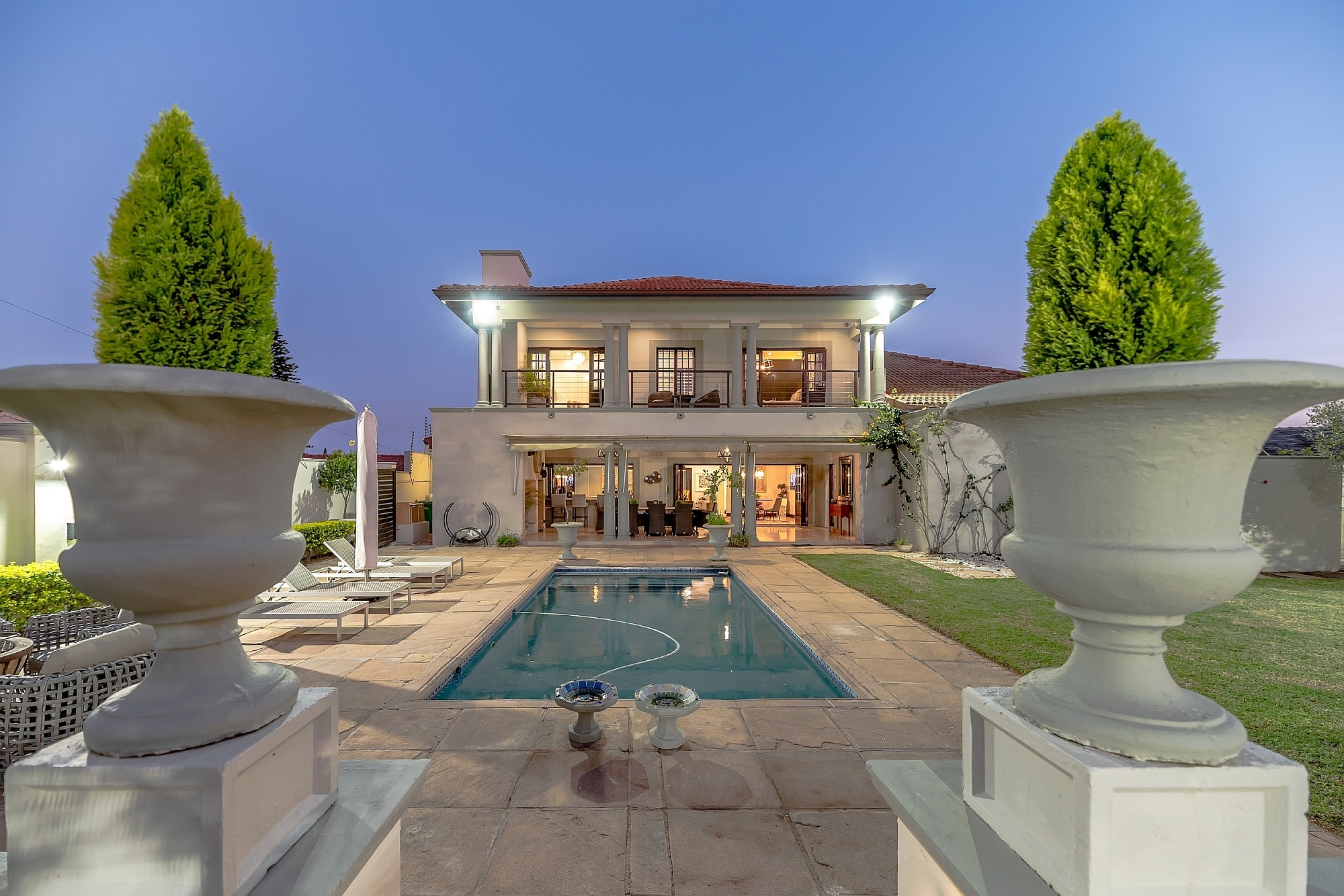 Situated in prestigious Herrwood Park in uMhlanga, this designer six-bedroom residence with a guest house and staff accommodation has featured on Top Billing TV show for outstanding design and décor. Priced at R14.995 million through Pam Golding Properties, the main home has four ensuite bedrooms with private balconies, large gourmet kitchen, undercover patio, private entertainment area and pool and 10-car automated garage and is close to top schools, uMhlanga beach and King Shaka International Airport. Situated in prestigious Herrwood Park in uMhlanga, this designer six-bedroom residence with a guest house and staff accommodation has featured on Top Billing TV show for outstanding design and décor. Priced at R14.995 million through Pam Golding Properties, the main home has four ensuite bedrooms with private balconies, large gourmet kitchen, undercover patio, private entertainment area and pool and 10-car automated garage and is close to top schools, uMhlanga beach and King Shaka International Airport.