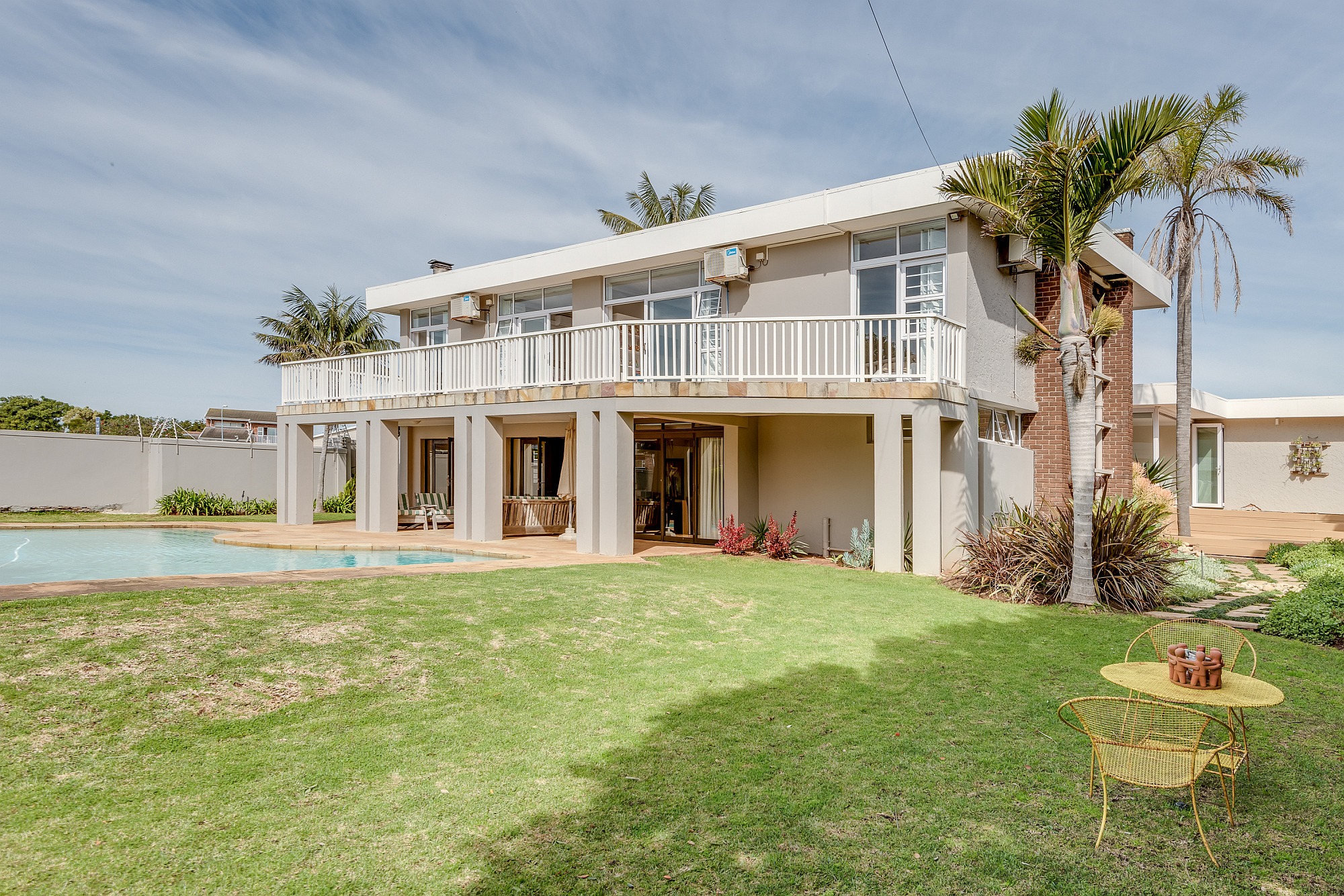 Priced at R4.495 million through Pam Golding Properties, this appealing and spacious four-bedroom home in Summerstrand in Gqeberha offers comfortable living and ideal entertainment space with a pool, deck and patio as well as a large garden. It includes an income-generating flatlet, Airbnb guest suite and staff accommodation. Priced at R4.495 million through Pam Golding Properties, this appealing and spacious four-bedroom home in Summerstrand in Gqeberha offers comfortable living and ideal entertainment space with a pool, deck and patio as well as a large garden. It includes an income-generating flatlet, Airbnb guest suite and staff accommodation.