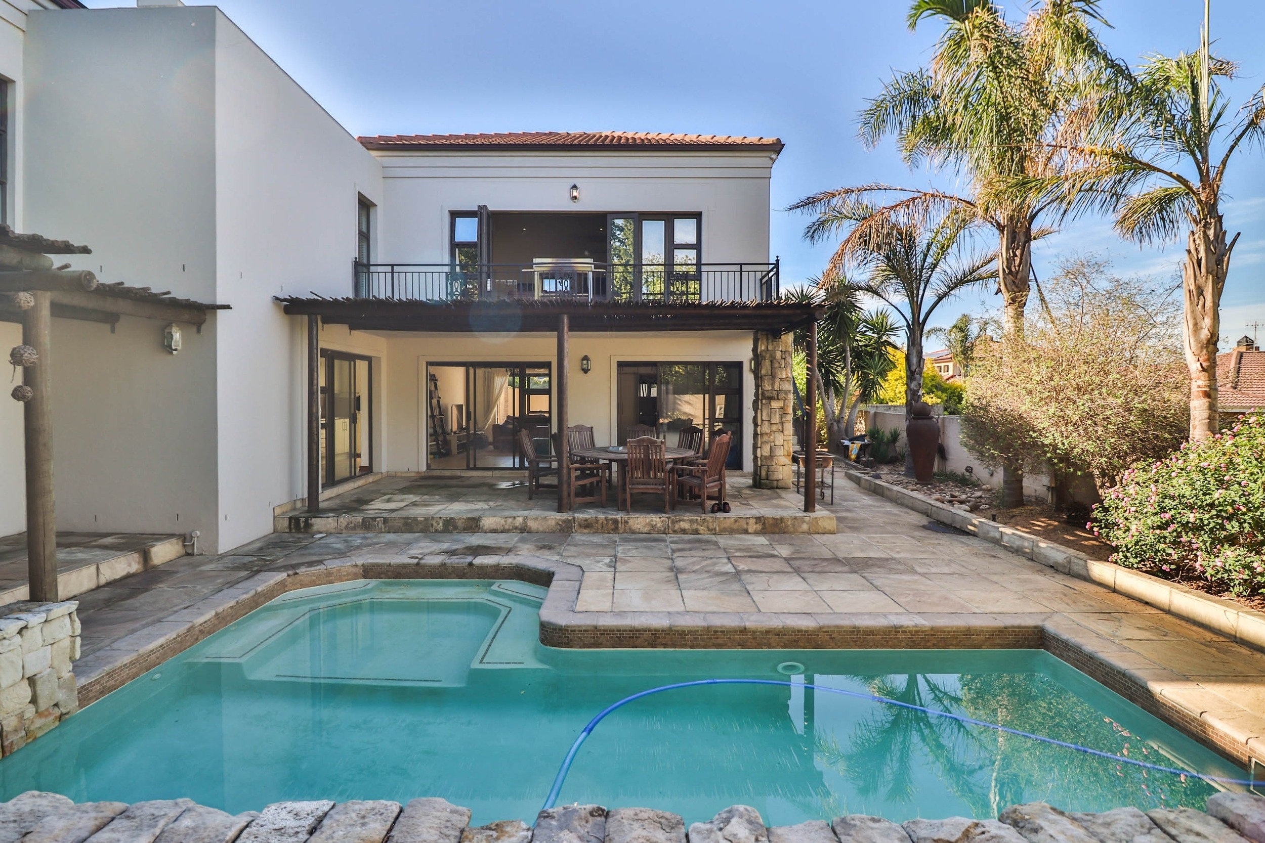 Priced at R6.495 million through Pam Golding Properties, this expansive, five-bedroom luxury property in Kleinbron Estate in Brackenfell offers an array of indoor and outdoor entertainment spaces, including indoor braai areas, separate flatlet or guest suite with its own kitchenette and living room, open-plan dining and living area, swimming pool, and solar panels. Situated near Curro Private School, Cape Gate shopping centre and Cape Gate Mediclinic, the estate has play parks and two dams. Priced at R6.495 million through Pam Golding Properties, this expansive, five-bedroom luxury property in Kleinbron Estate in Brackenfell offers an array of indoor and outdoor entertainment spaces, including indoor braai areas, separate flatlet or guest suite with its own kitchenette and living room, open-plan dining and living area, swimming pool, and solar panels. Situated near Curro Private School, Cape Gate shopping centre and Cape Gate Mediclinic, the estate has play parks and two dams.