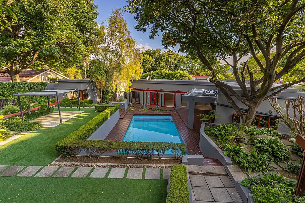 Priced at R5.95 million through Pam Golding Properties, this spacious and modern three-bedroom home in Parktown North offers seamless flow and an abundance of natural light within a tranquil setting. The property includes a deck, pool and landscaped garden, as well as a contemporary flatlet with two private access points - ideal for extended family, a home office, rental income, or an impressive guest suite. Additional features include a double garage, carport, and ample visitor parking. 