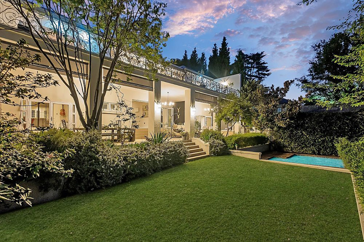 Regarded as one of Upper Parkwood's finest homes, this magnificent five-bedroom property offers versatile family, staff or work-from-home accommodation – including a two-room/two-bathroom garden cottage and studio flatlet above the garage – as well as exceptional entertainment amenities. Priced at R7.95 million through Pam Golding Properties, it includes a grand staircase, a comprehensive alternative energy system, advanced home automation with extensive security features, plus water tanks. 