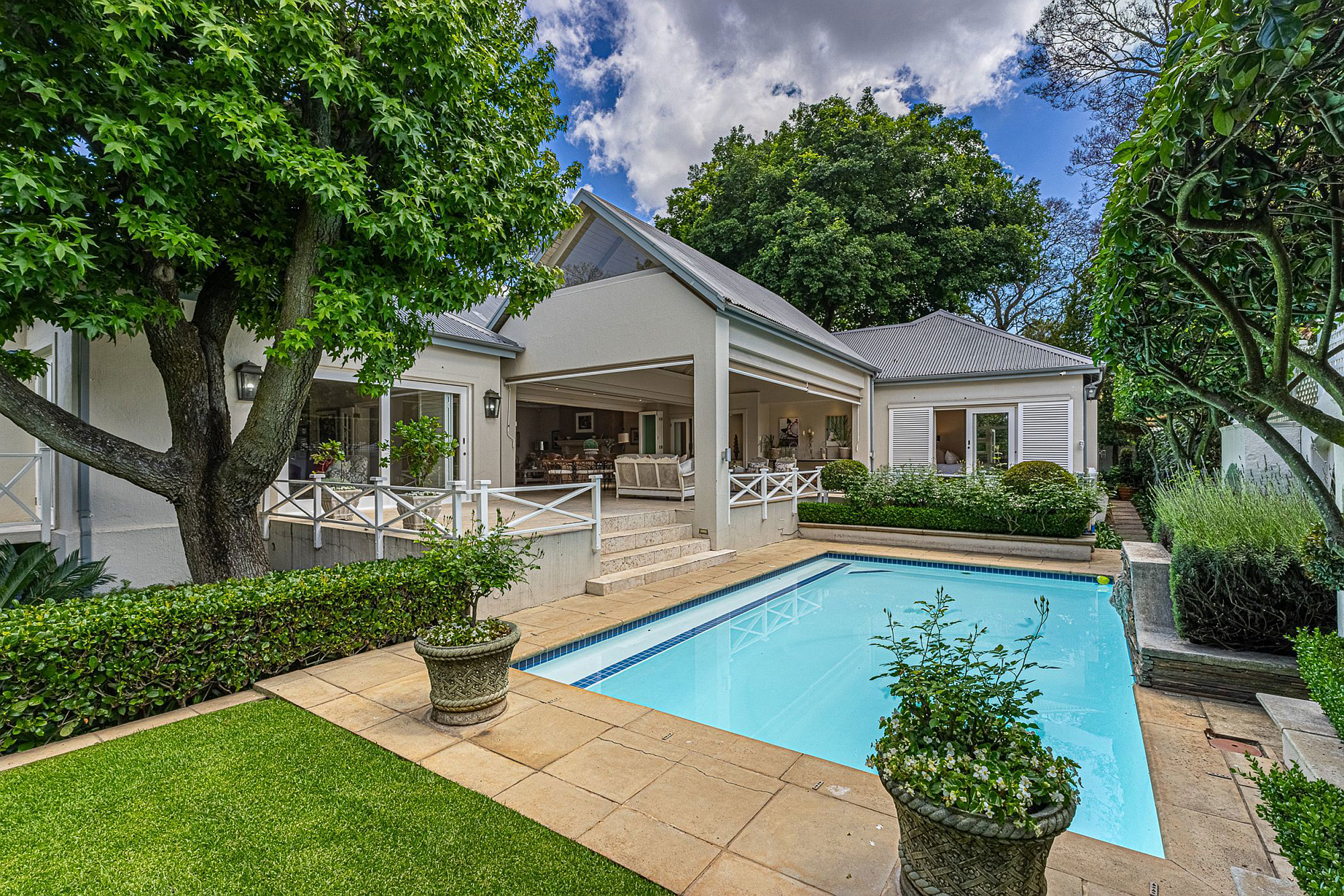 Melrose R13.8m for sale: Priced at R13.8 million through Pam Golding Properties, and situated in Melrose, close to excellent schools and the Rosebank Gautrain Station, this upmarket four-bedroom family home caters for relaxed and formal entertaining. The property includes a borehole, generator and piped gas.
